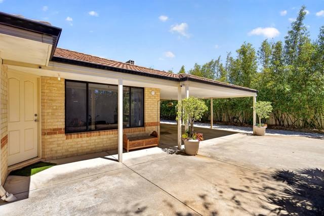Front door and verandah beside the bamboo